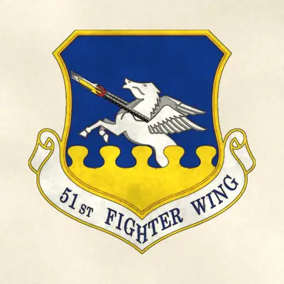 51st Fighter Wing (Air Force) organizational emblem, redrawn in ink and watercolor from the public-domain reference image